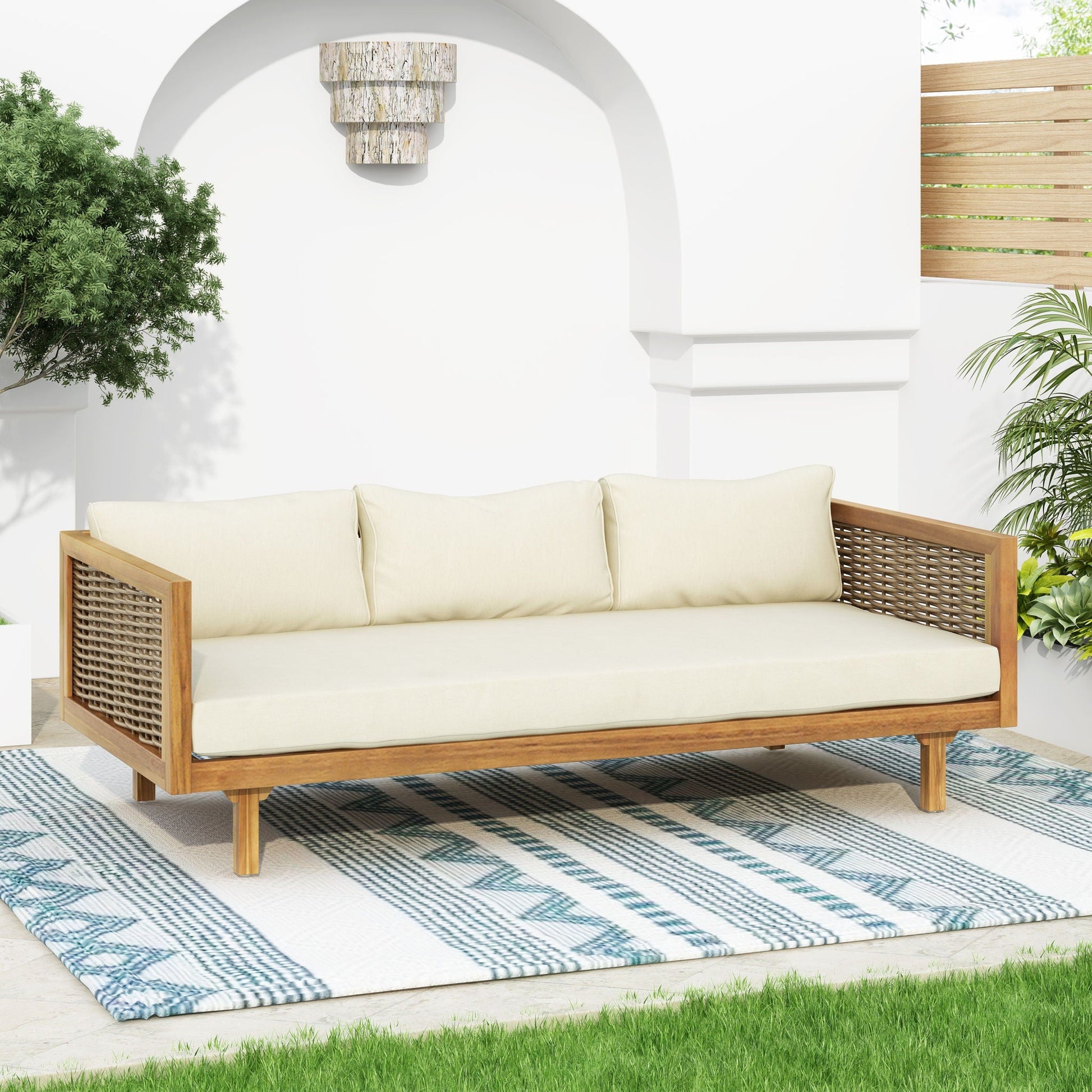 Claremont 3 Seater Daybed in teak acacia wood with water-resistant beige cushions on Tampa Home & Garden Store