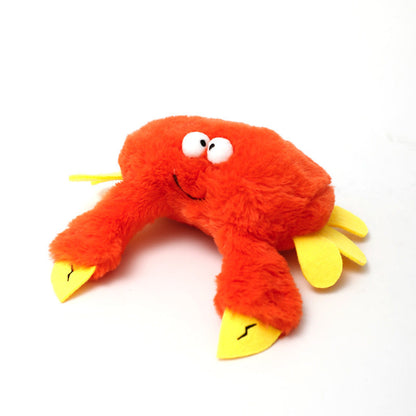Pet plush crab toy in bright orange with yellow claws and a friendly smile on Tampa Home & Garden Store