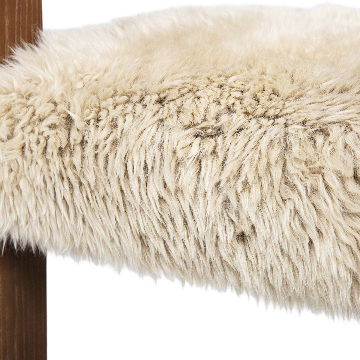 Low back counter stool with light beige sheepskin fur seat and wooden leg by HouseOfZazla on Tampa Home & Garden Store
