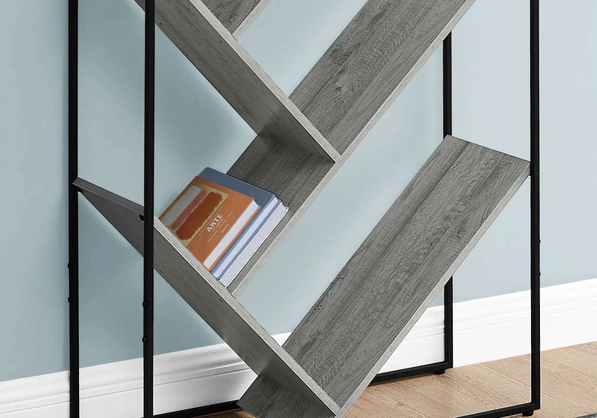 3-tier etagere bookshelf with black metal frame and cross supports; books on lower shelf on Tampa Home & Garden Store