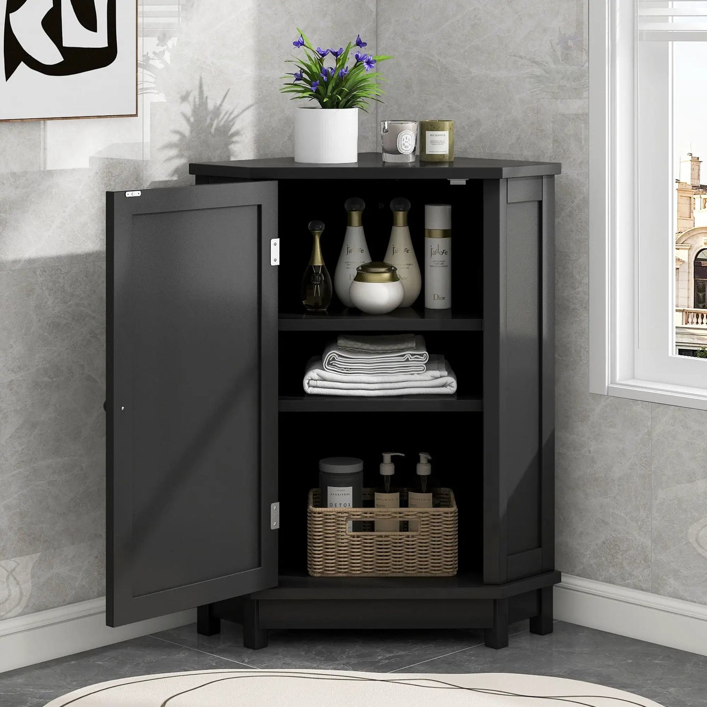 Bathroom triangle corner storage cabinet in black with adjustable shelf; top plant and candle on Tampa Home & Garden Store