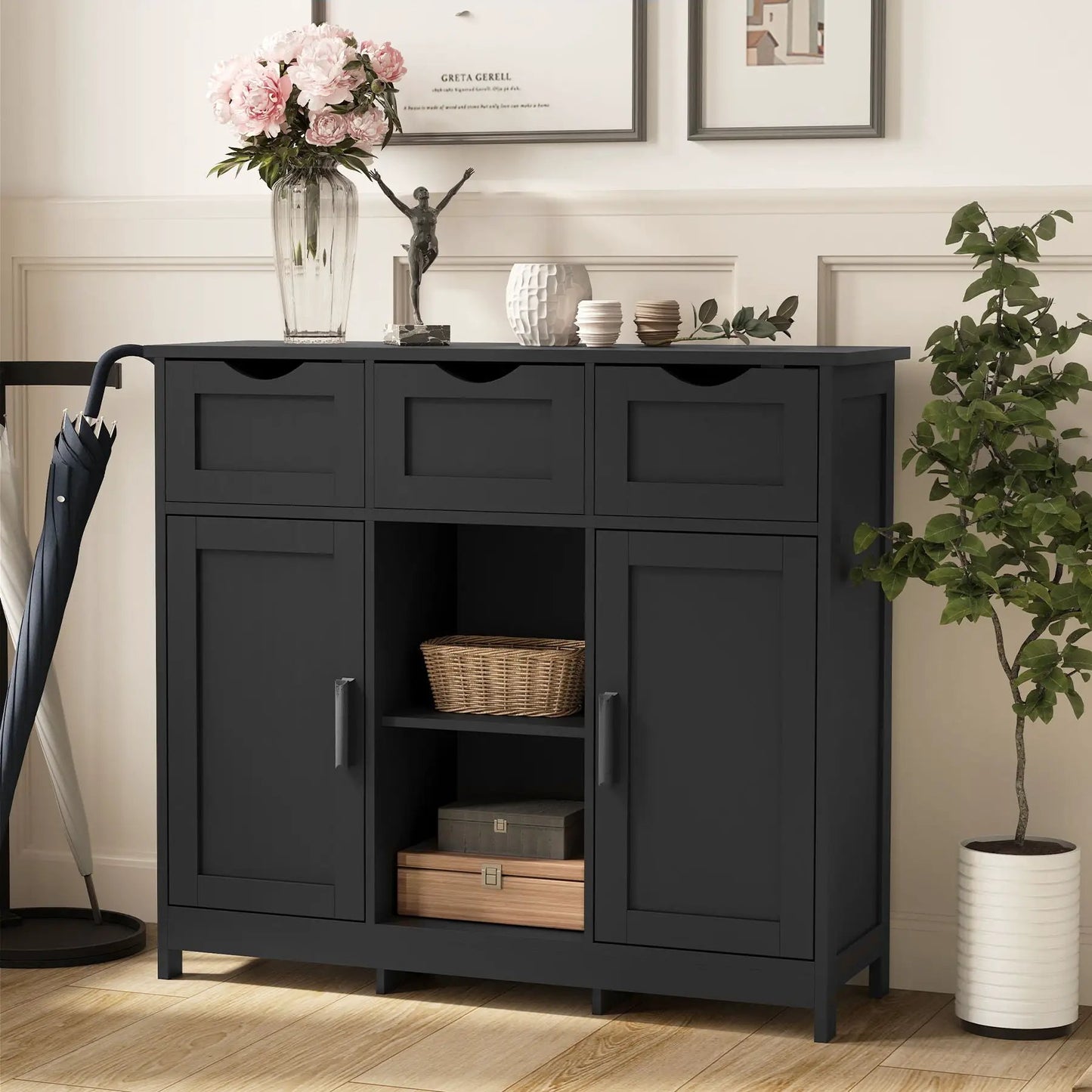 Storage cabinet in dark gray with drawers and open shelf, pink peony vase and sculptural decor on Tampa Home & Garden Store
