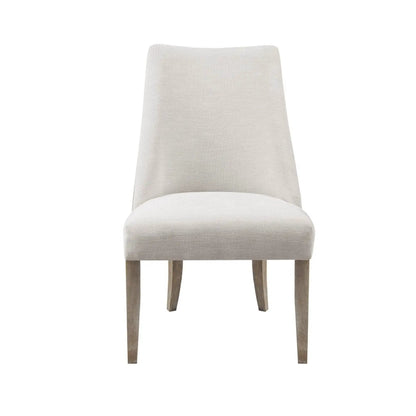 Comfortable dining chair upholstered in beige fabric with wooden legs on Tampa Home & Garden Store