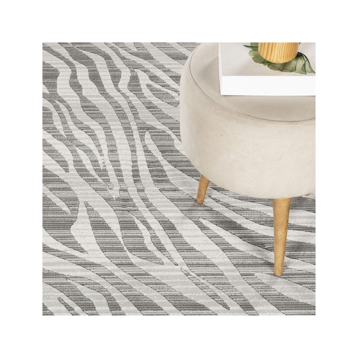 Plush geometric area rug ivory gray hues with zebra-like pattern from HouseOfZazla on Tampa Home & Garden Store