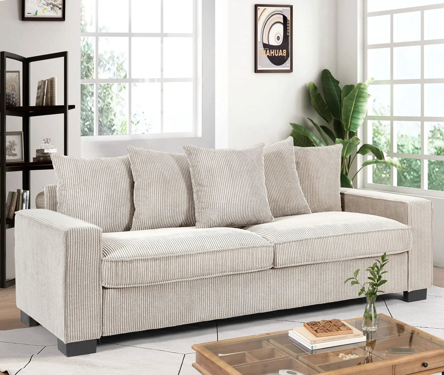 Luxe 3-seater sofa with 5 beige toss pillows in textured fabric on Tampa Home & Garden Store