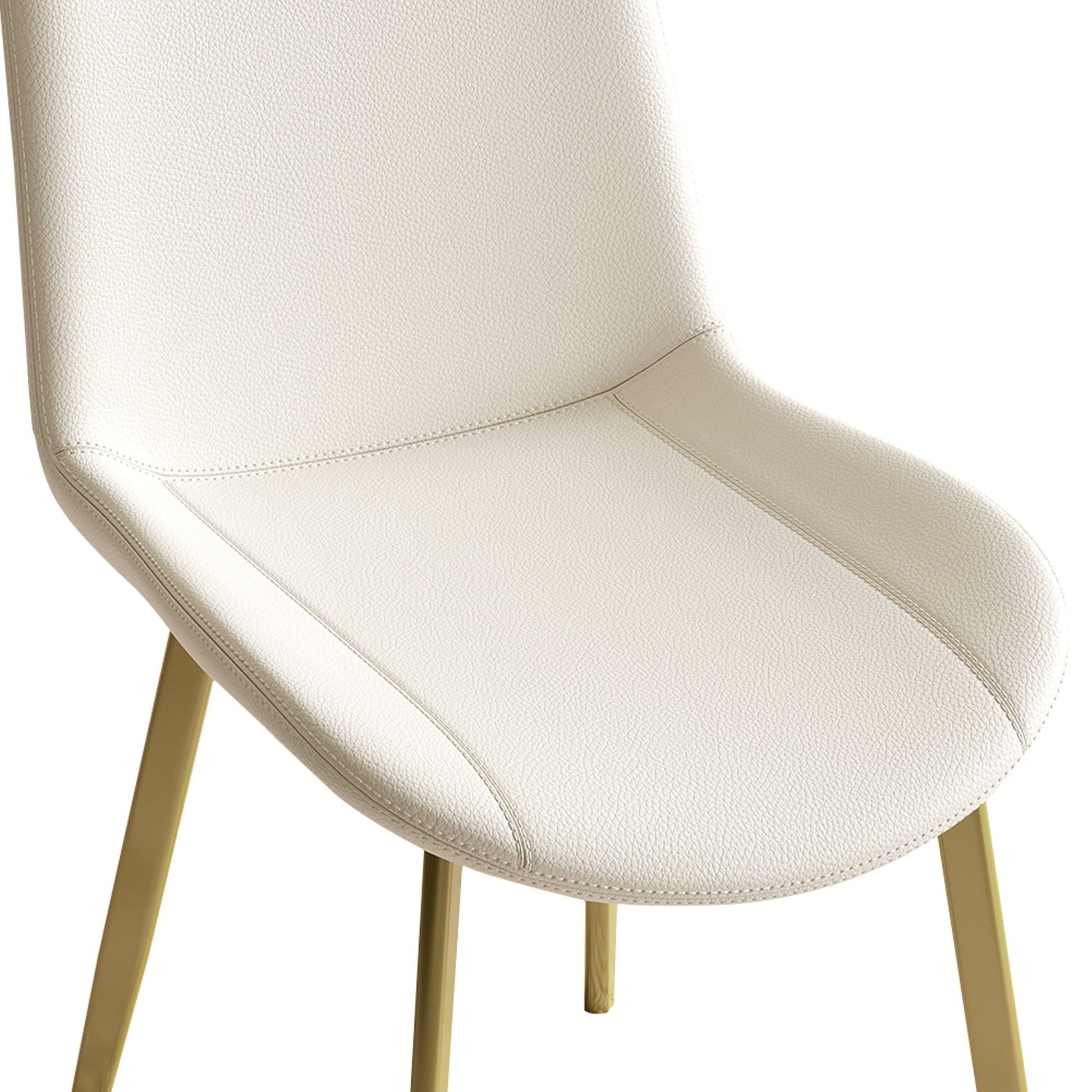 Beige faux leather dining chair close view with curved ergonomic seat and light wood legs on Tampa Home & Garden Store