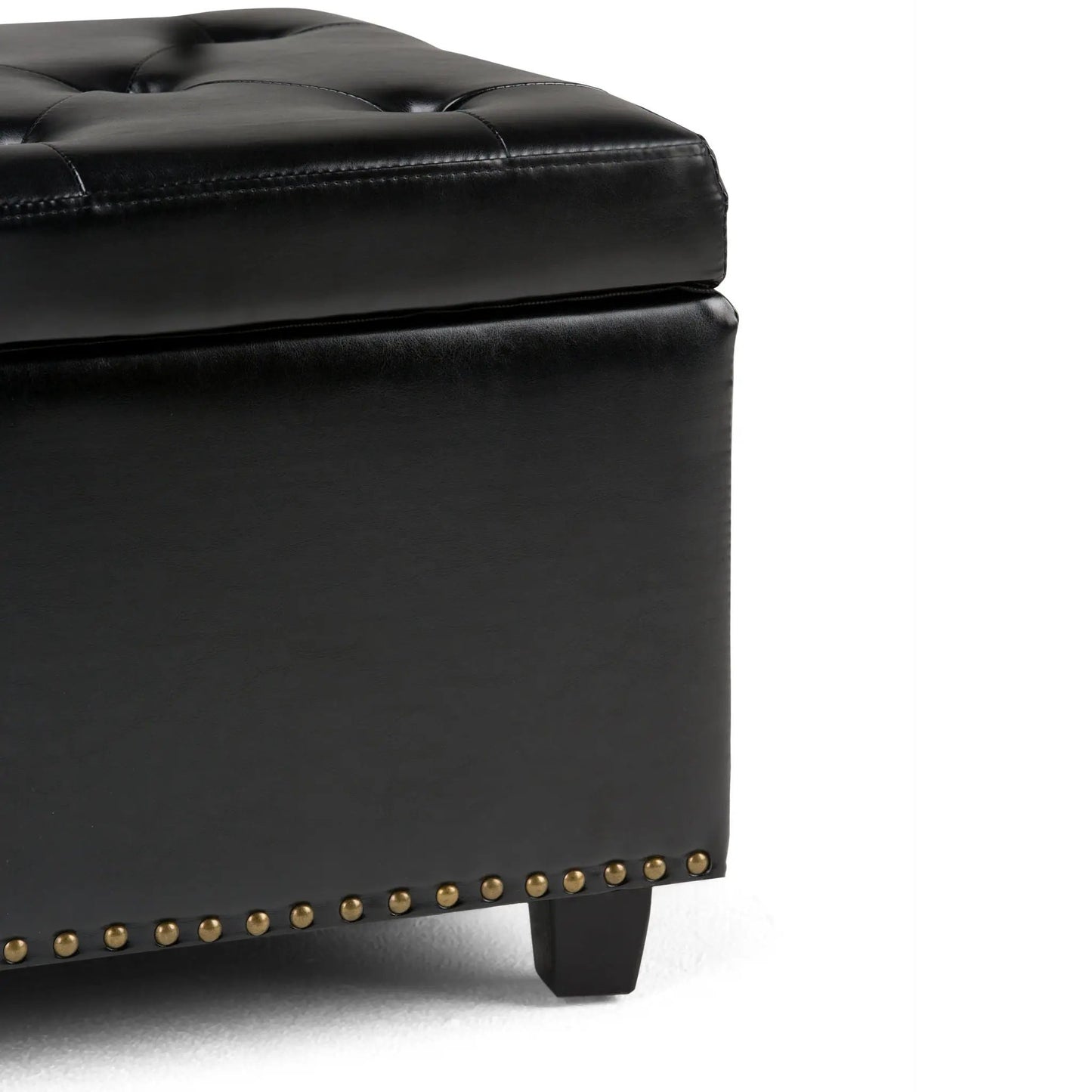 Hamilton Upholstered Storage Ottoman in black leather with tufted top and brass nailhead trim on Tampa Home & Garden Store