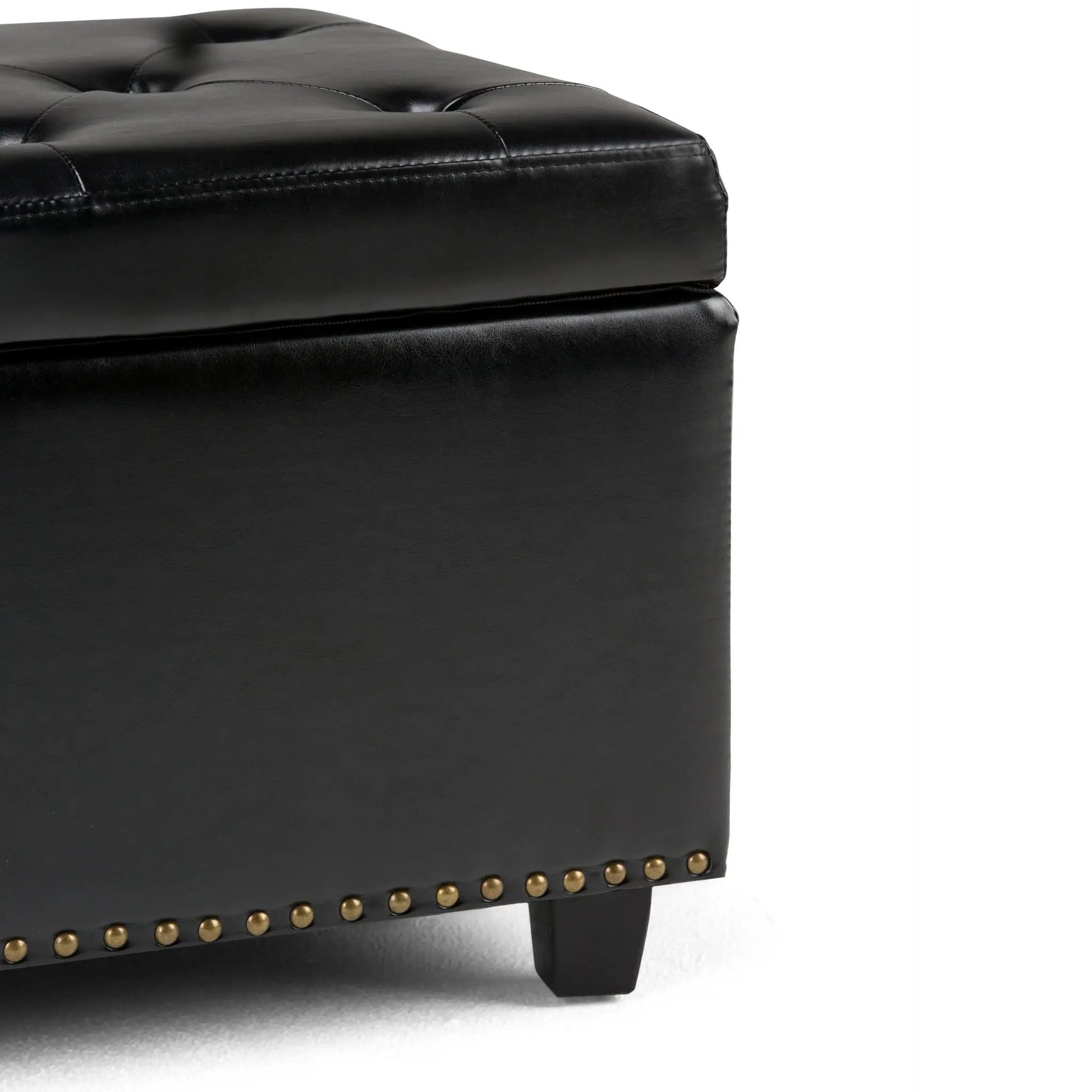 Hamilton Upholstered Storage Ottoman in black leather with tufted top and brass nailhead trim on Tampa Home & Garden Store
