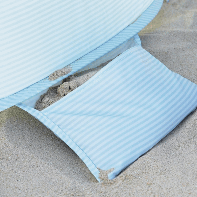 Tiny Land pop-up beach tent with blue and white stripes and a matching sand cushion on Tampa Home & Garden Store