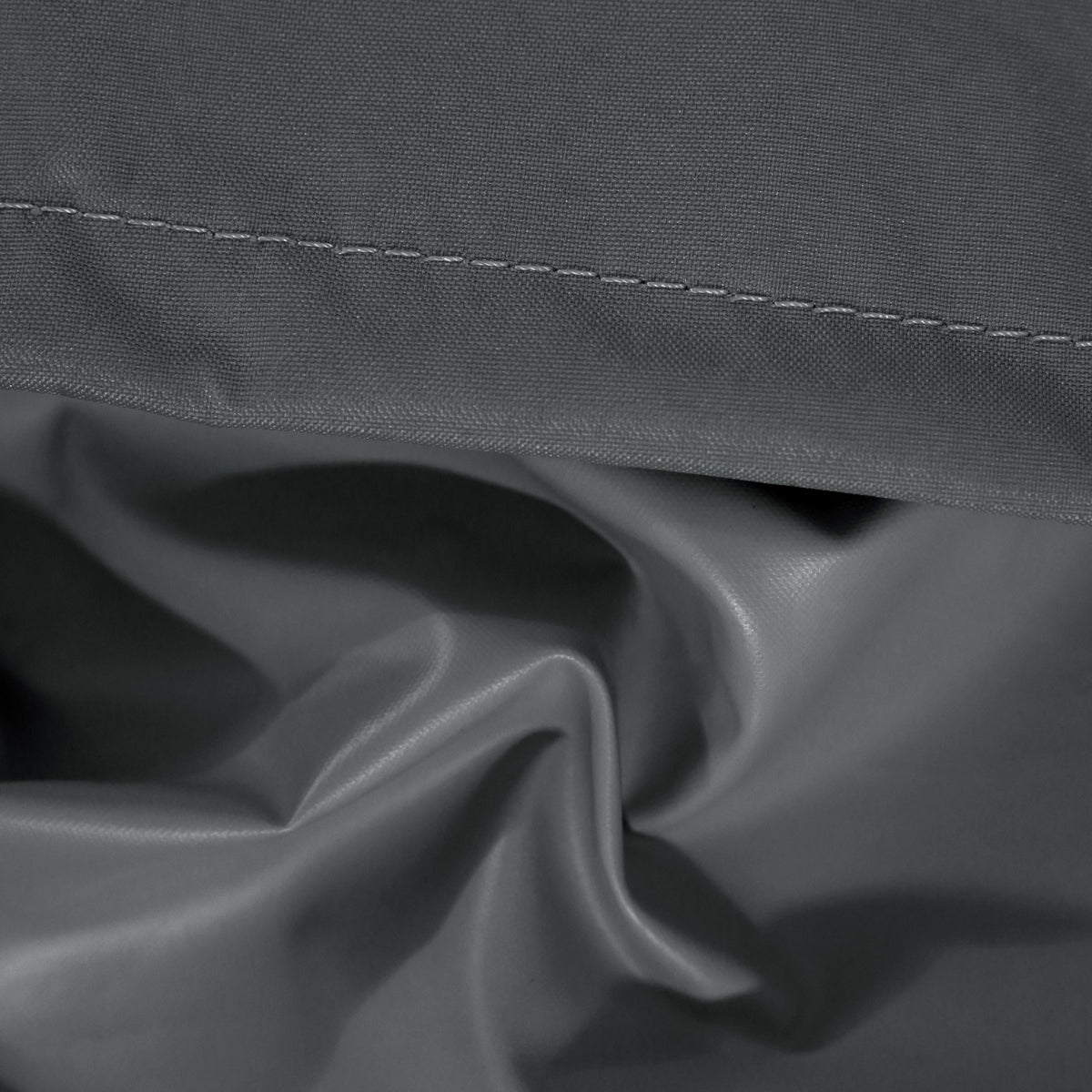 Shield Outdoor Loveseat Sofa Cover dark gray fabric close-up with stitching by HouseOfZazla on Tampa Home & Garden Store