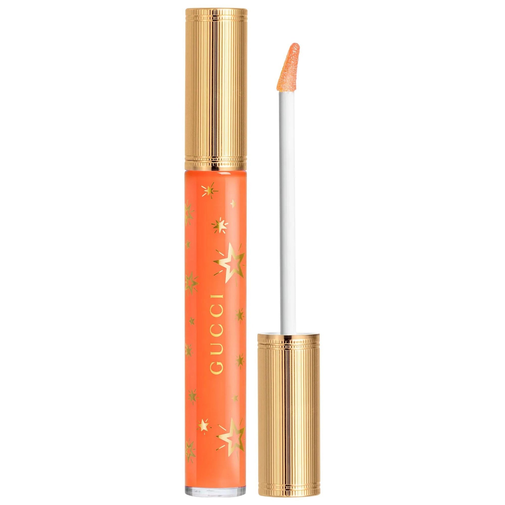 Gucci hydrating plumping lip gloss in orange coral tube with gold cap and star pattern on Tampa Home & Garden Store