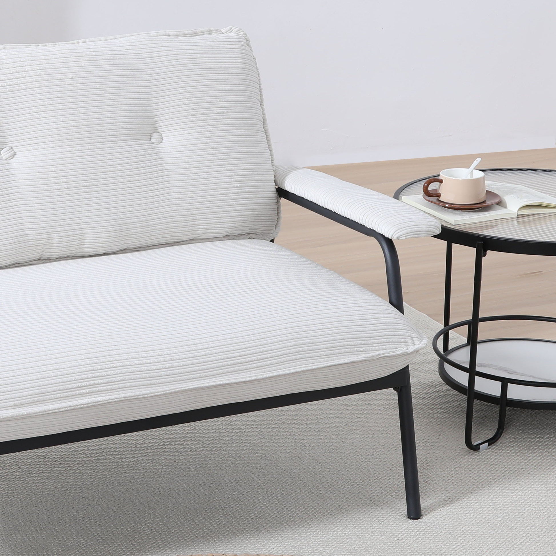 Modern metal-frame sofa with cream upholstery and sponge-filled cushions HouseOfZazla on Tampa Home & Garden Store