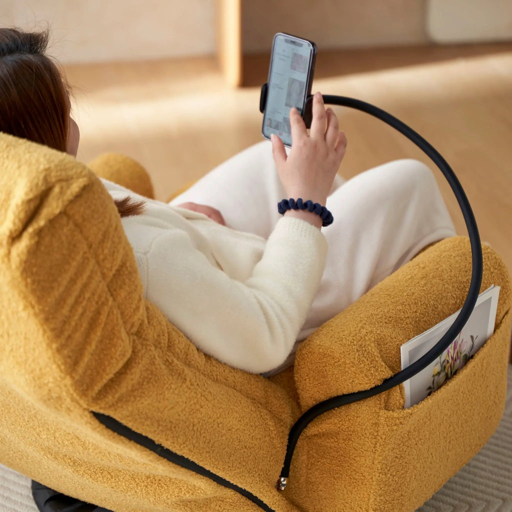 Adjustable swivel lounge chair with 360° rotating seat in golden boucle on Tampa Home & Garden Store