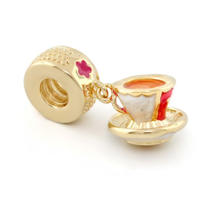 Gabriella Beads Tea charm by Lauren G Adams, gold-tone bead with pink floral and teacup pendant on Tampa Home & Garden Store