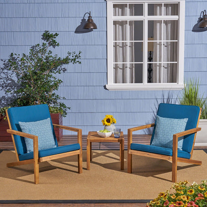 Celestaria 3-Piece Outdoor Chat Set with two Adirondack chairs and blue cushions plus side table on Tampa Home & Garden Store