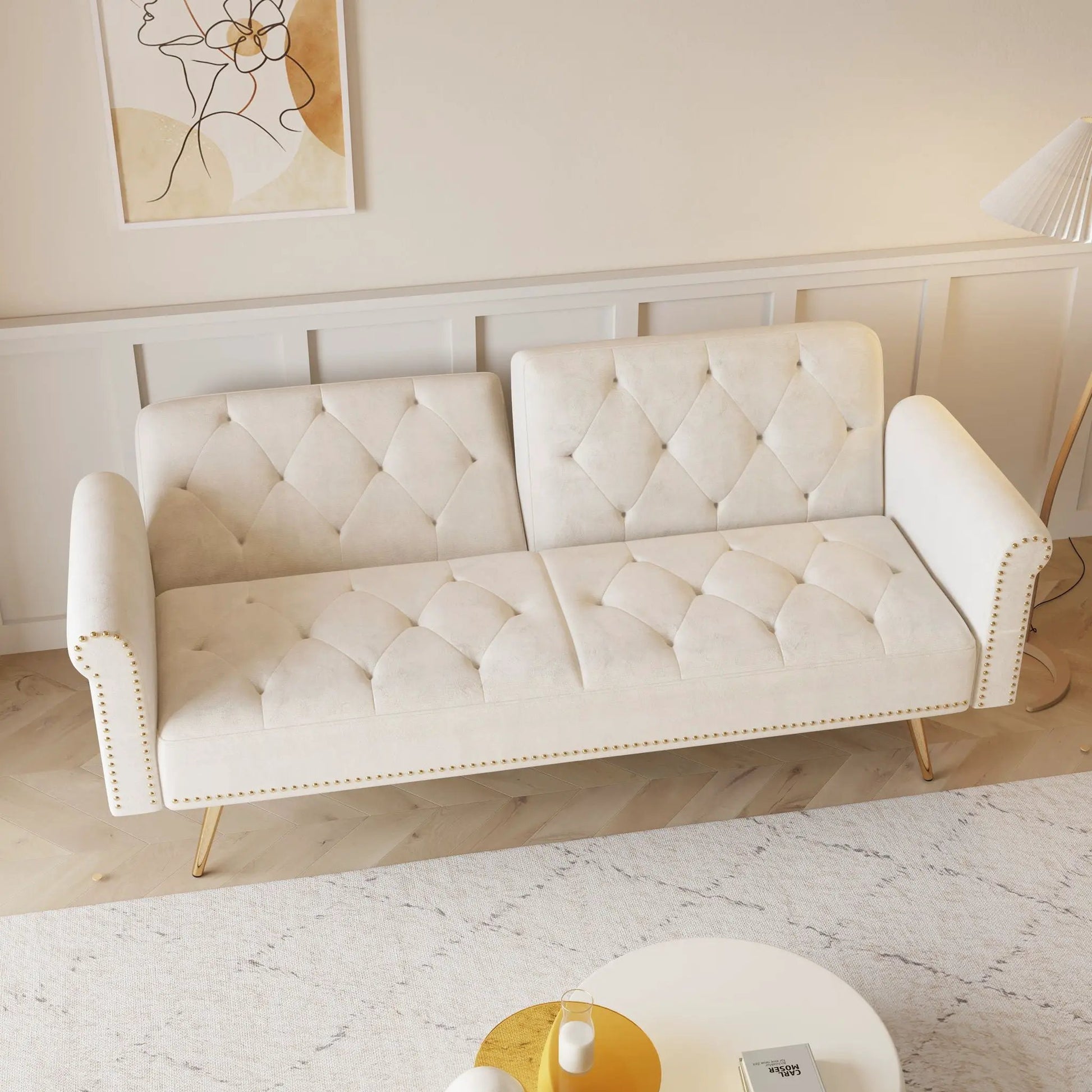 Ivory tufted futon sofa bed with nail head trim and matching pillow by Unique Piece Furniture on Tampa Home & Garden Store