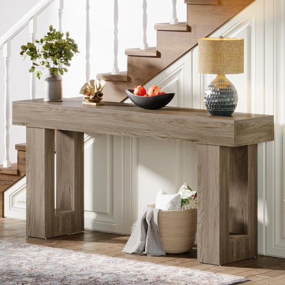 Extra long narrow console table with open shelf in brown wood finish, styled with lamp and vase on Tampa Home & Garden Store