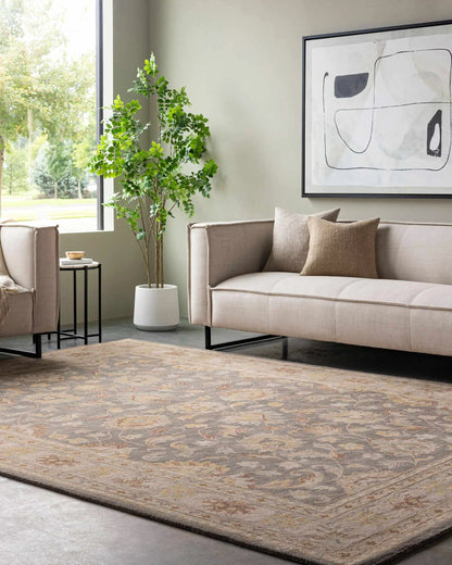 Cherryfield Hand Tufted Taupe Wool Rug by Boutique Rugs in a living room with a beige sofa on Tampa Home & Garden Store