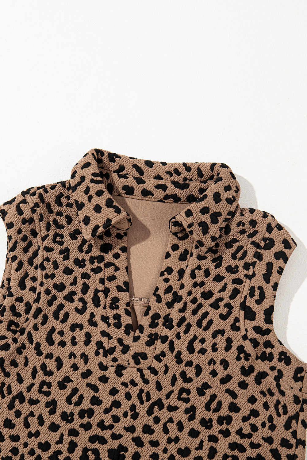 Leopard print sleeveless mini dress tan with black spots textured fabric Stevvex on Tampa Home & Garden Store