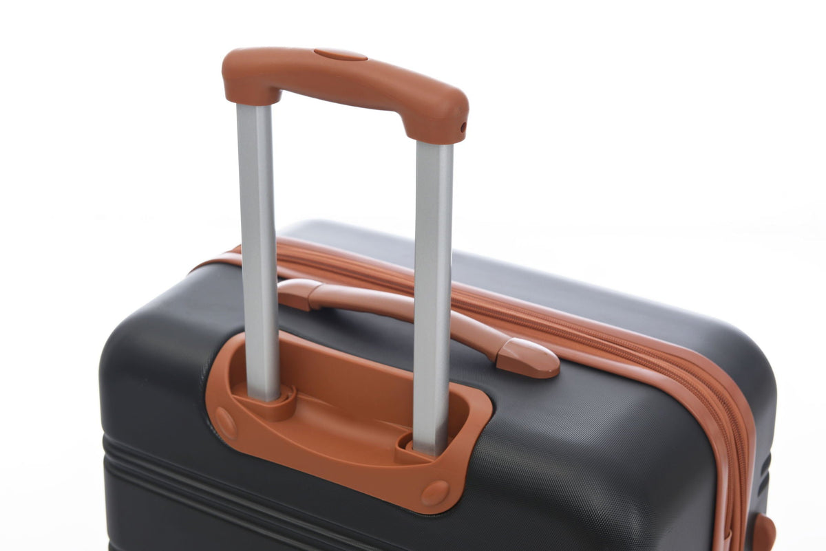 Hardshell luggage set with orange trim and silver telescoping handle, spinner suitcase on Tampa Home & Garden Store