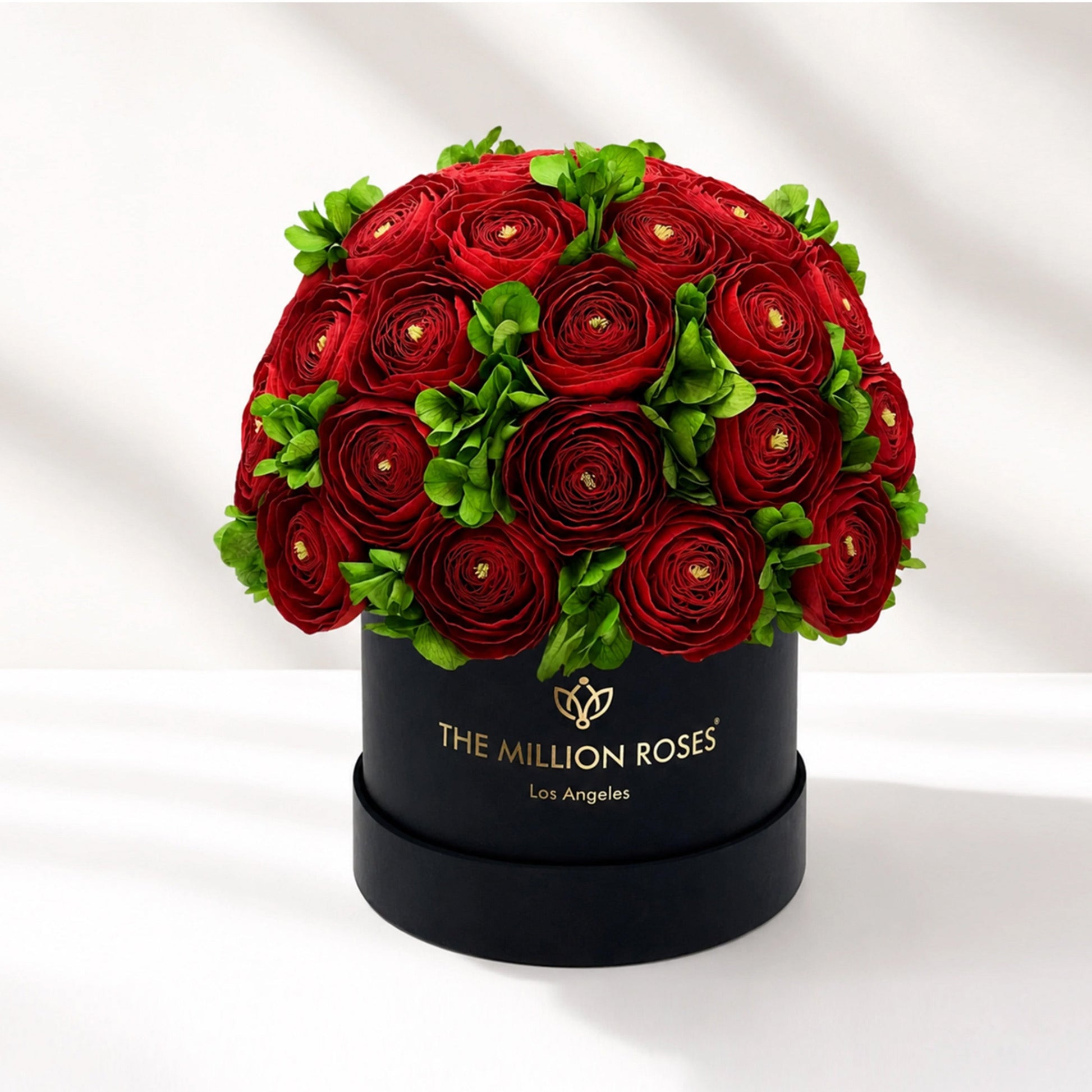 Classic Black Box red rose bouquet by The Million Roses with green leaves on Tampa Home & Garden Store