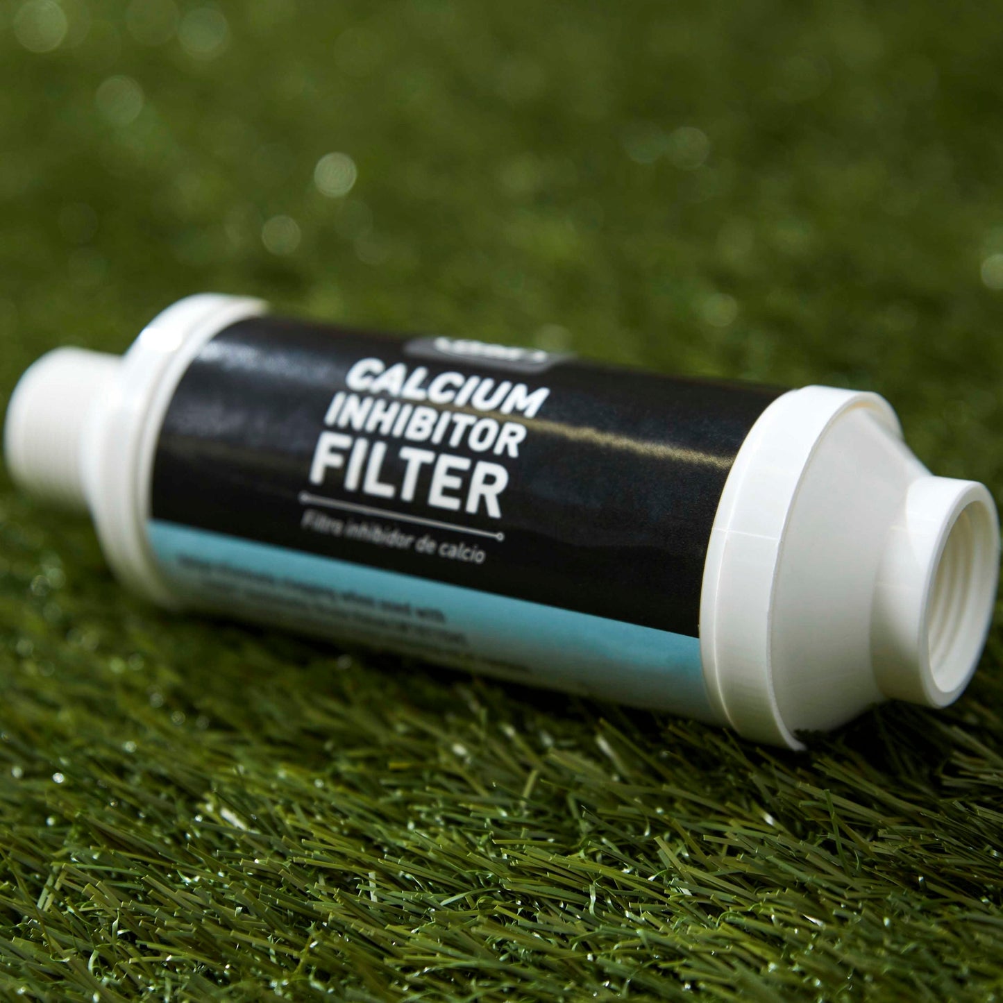Mist calcium inhibitor filter, Orbit black body with white ends on grass lawn on Tampa Home & Garden Store