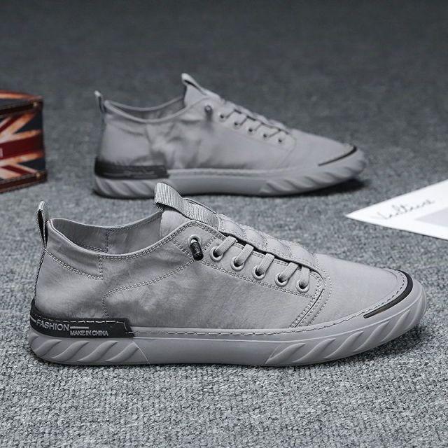 Stevvex pair of canvas men's grey sneakers, breathable cloth upper, lace-up casual walking shoes on Tampa Home & Garden Store