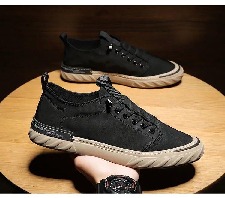 Stevvex canvas men's sneakers pair, black upper with beige sole, lace-up casual walking shoes on Tampa Home & Garden Store
