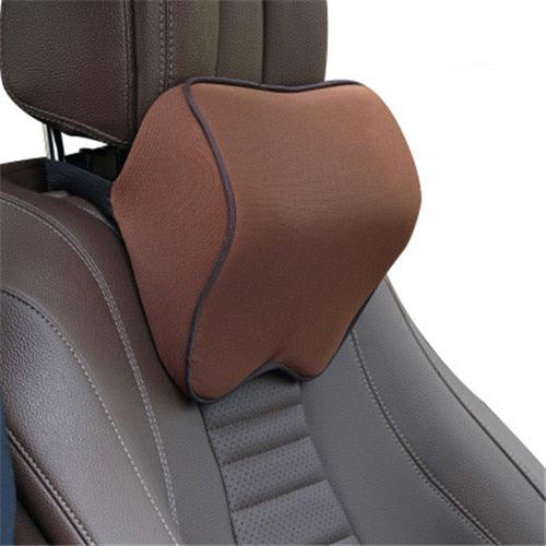 Car neck headrest pillow with brown memory foam cover and adjustable strap on car seat on Tampa Home & Garden Store