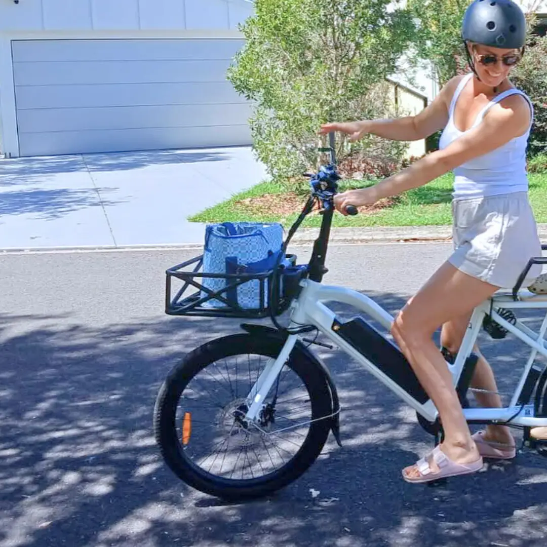 Basket Black front bicycle basket with blue bag mounted on white e-bike on Tampa Home & Garden Store