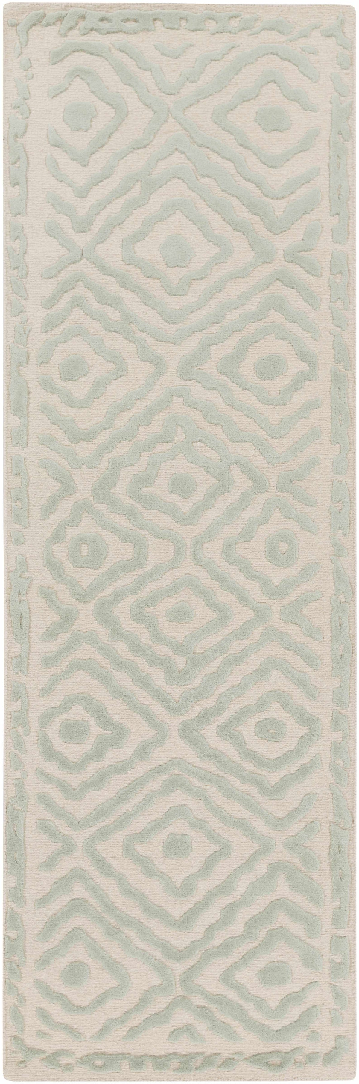 Carnegie Area Rug by Boutique Rugs, cream with pale blue geometric ikat pattern, runner style on Tampa Home & Garden Store