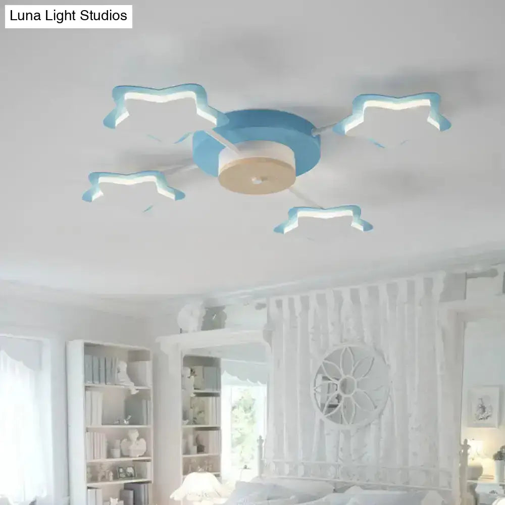 Pink Star LED Ceiling Light flush mount with 4 blue-edged star fixtures around blue center on Tampa Home & Garden Store