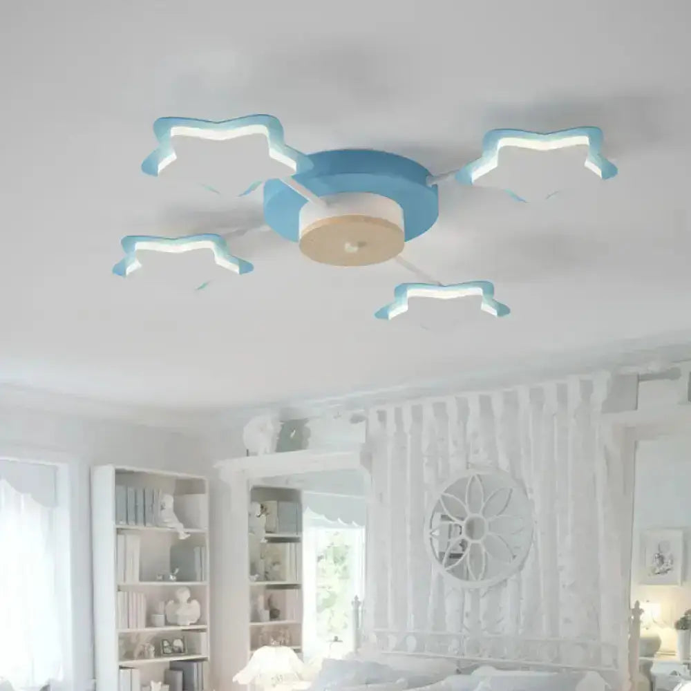 Pink Star LED ceiling light, blue base with star-shaped accents, Decorbites flush mount on Tampa Home & Garden Store