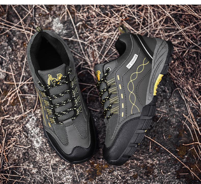 Casual men's outdoor athletic shoes Stevvex, dark gray leather with yellow laces, outsole pair on Tampa Home & Garden Store