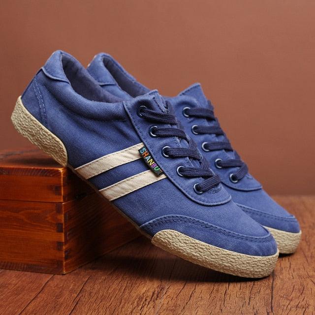 Stevvex blue canvas lace-up sneakers, round toe, beige textured sole and side stripes on Tampa Home & Garden Store