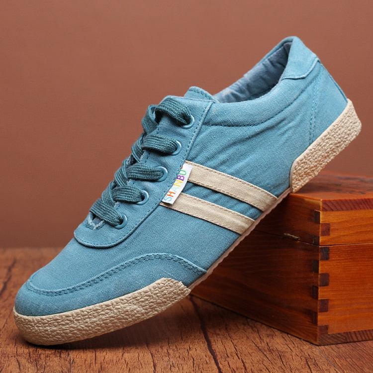 Stevvex blue canvas lace-up sneakers with round toe and beige side stripes textured sole on Tampa Home & Garden Store