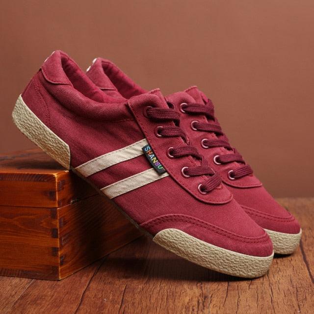 Stevvex casual canvas sneakers burgundy with beige stripes, lace-up, two sneakers on Tampa Home & Garden Store