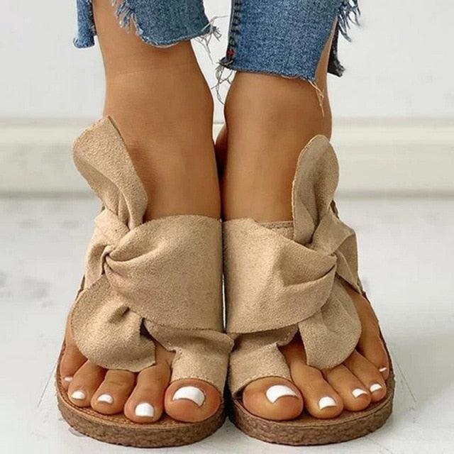 Pair of beige suede knot-strap platform sandals for women with open toes and rope sole by Stevvex on Tampa Home & Garden Store