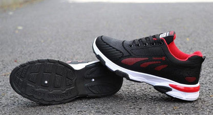 Stevvex athletic shoes black mesh pair with red trim non-slip outsole on Tampa Home & Garden Store