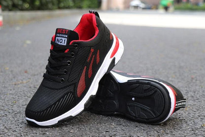 Stevvex athletic mesh sneakers pair with black red accents, cushioned non-slip outsole on Tampa Home & Garden Store