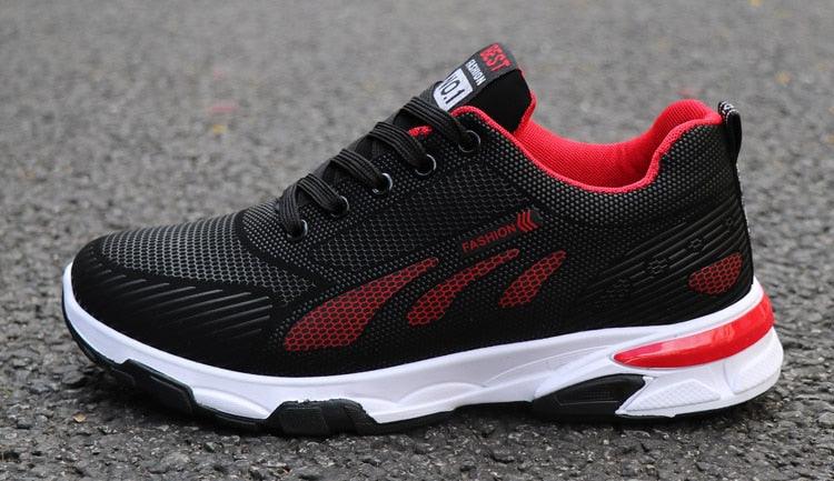 Stevvex men's athletic sneakers, black mesh with red accents and white cushioned sole on Tampa Home & Garden Store