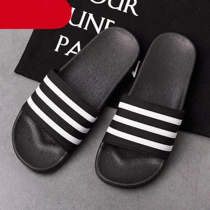 Stevvex black and white striped slide sandals for casual summer wear on Tampa Home & Garden Store