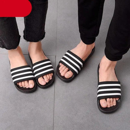Stevvex striped slide sandals with black straps and white stripes, casual summer footwear on Tampa Home & Garden Store