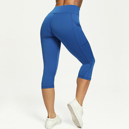 Blue cropped women's leggings with high waist and pocket for workouts on Tampa Home & Garden Store