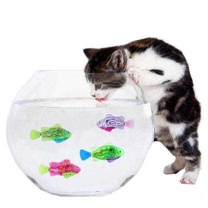 Stevvex cat interactive water toy: four LED-lit plastic fish in round glass bowl, cat watching on Tampa Home & Garden Store