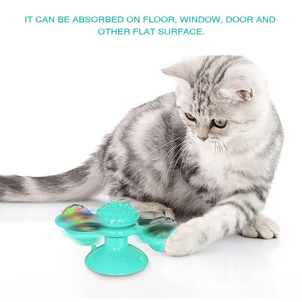 Cat Windmill Toy turquoise rotating massaging toy with suction cup base on Tampa Home & Garden Store