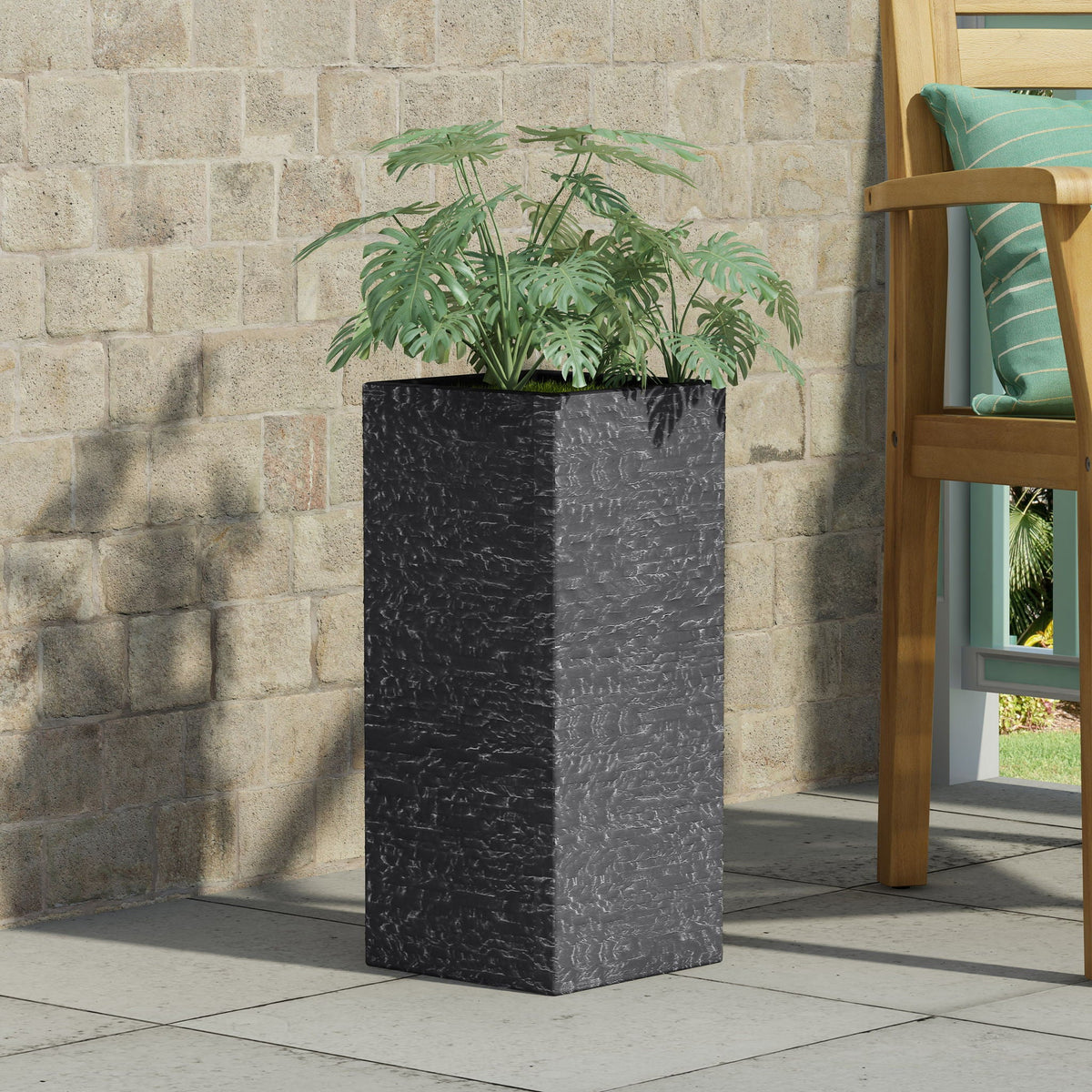 Modern Outdoor Planter black textured finish with lush monstera plant HouseOfZazla on Tampa Home & Garden Store