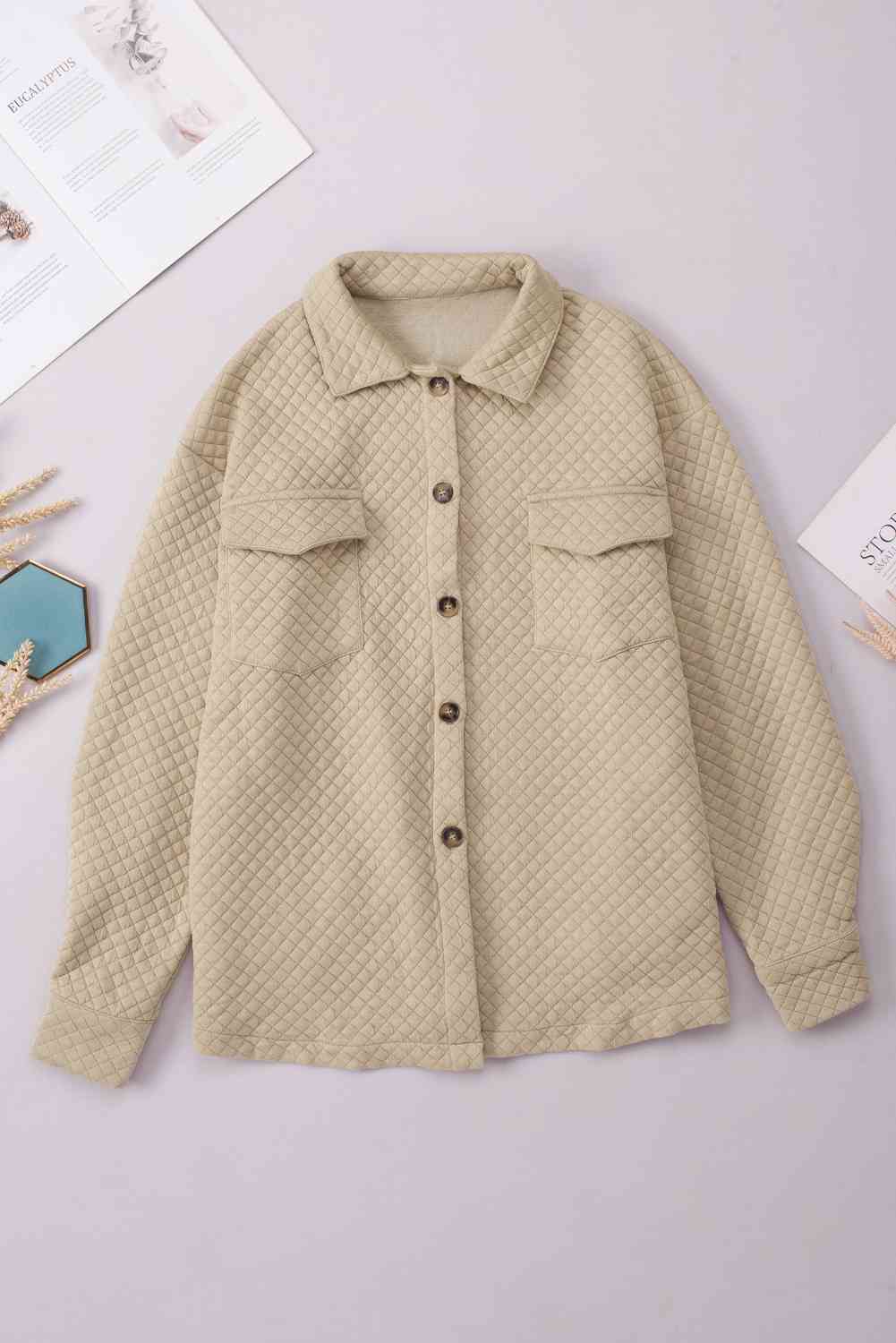 Comfortable beige quilted button-down collared jacket with two front pockets by Stevvex on Tampa Home & Garden Store