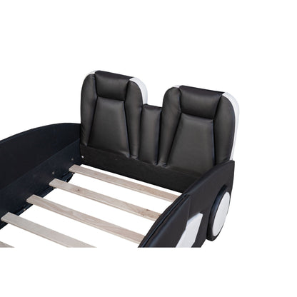 Race car shaped twin platform bed with black padded panels and light pine slats on Tampa Home & Garden Store