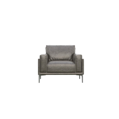 Transitional fabric arm chair in dark gray with relaxed seating, white stitching, metal legs on Tampa Home & Garden Store